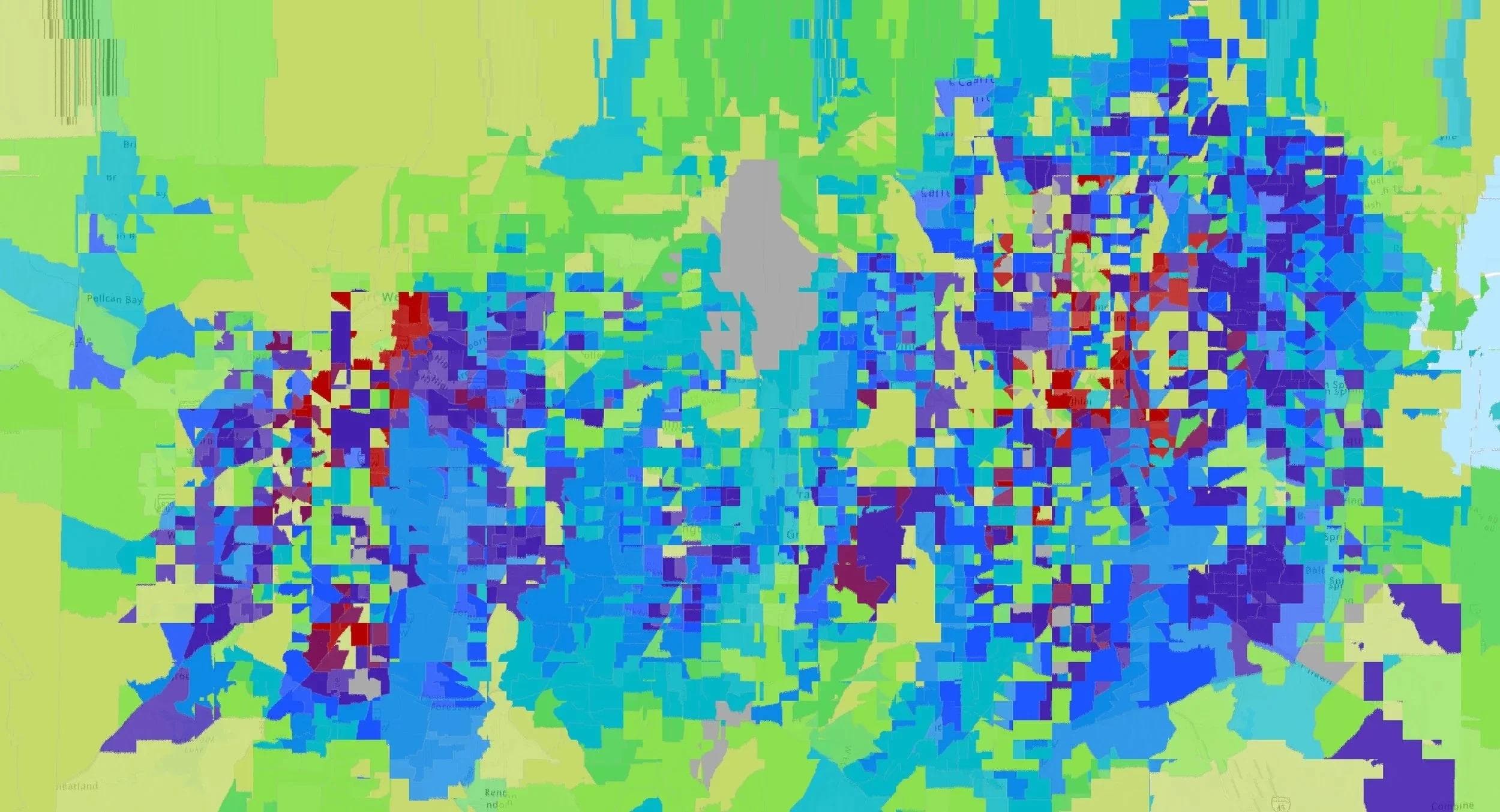 Glitched map of primarily green, blue, and red.